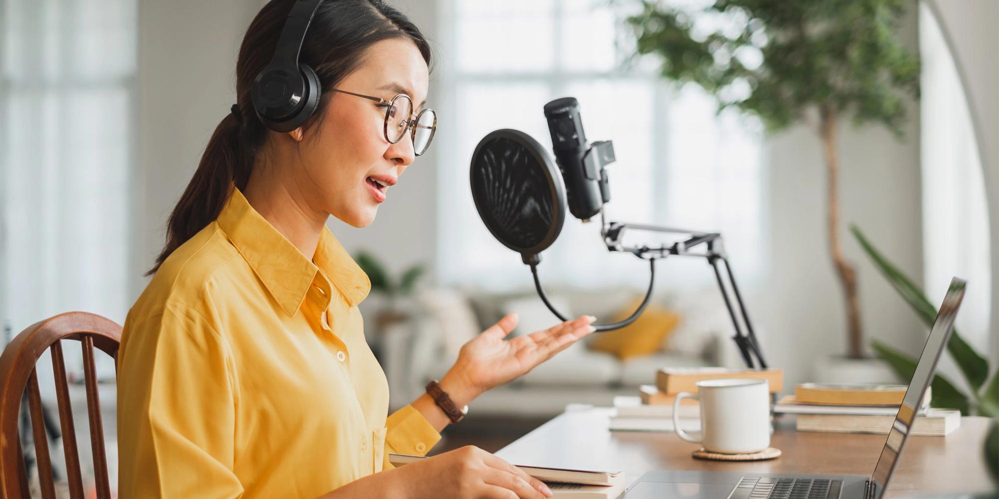 woman recording a podcast
