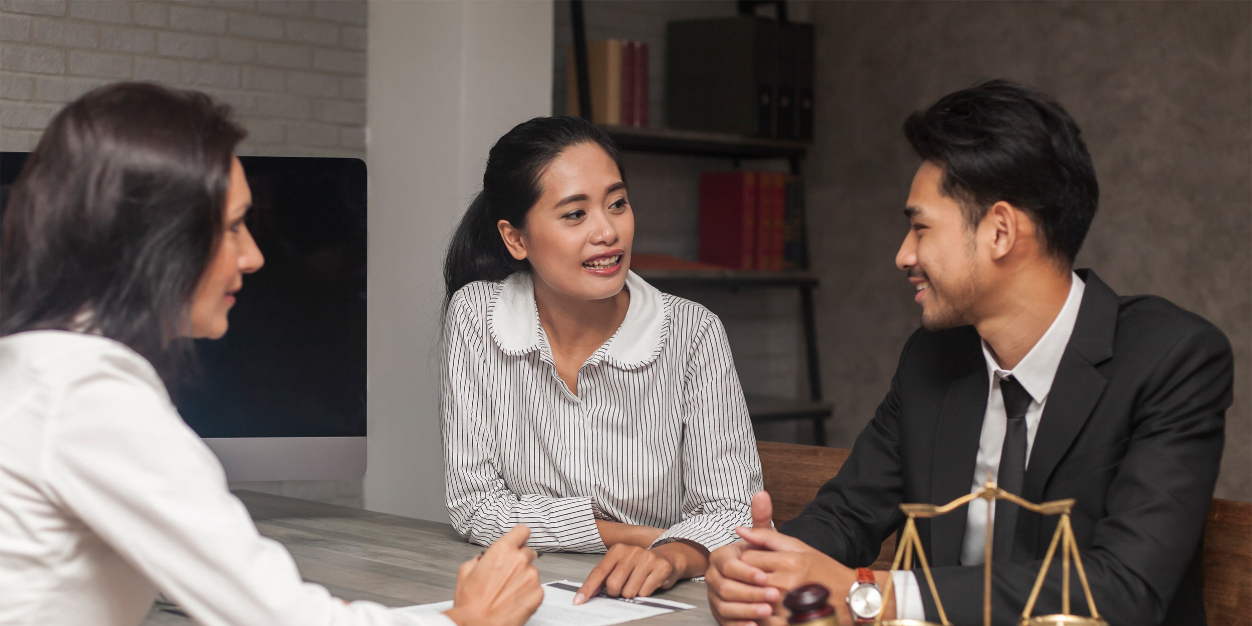 Lawyer giving consultation to clients