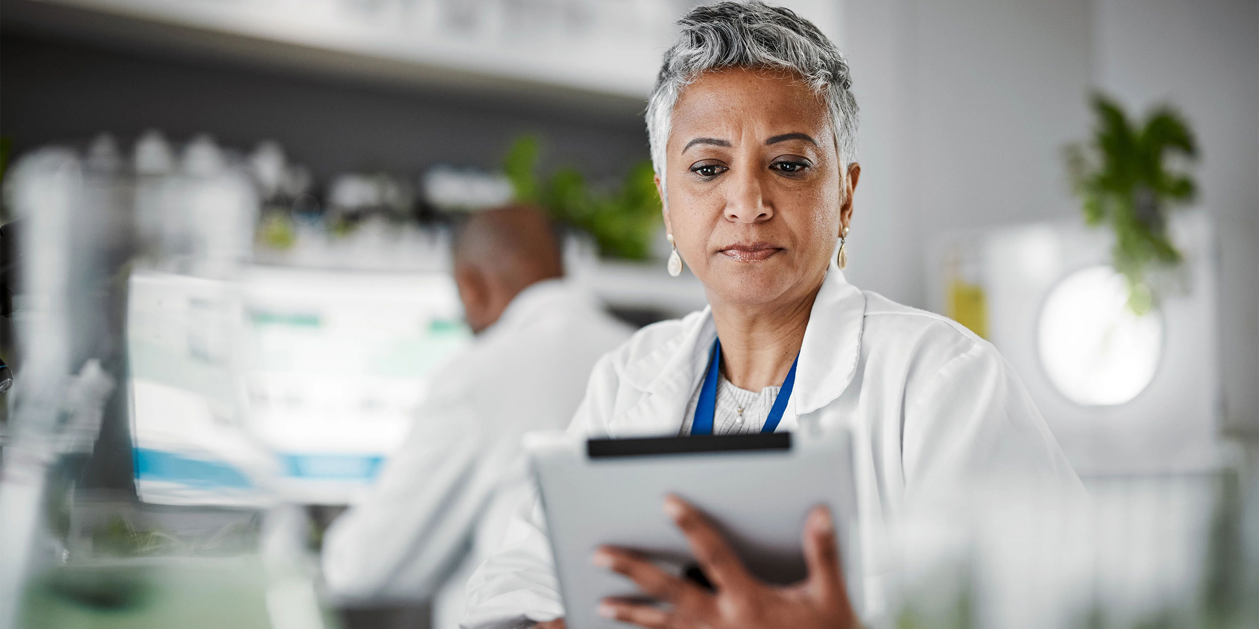woman looking at a tablet