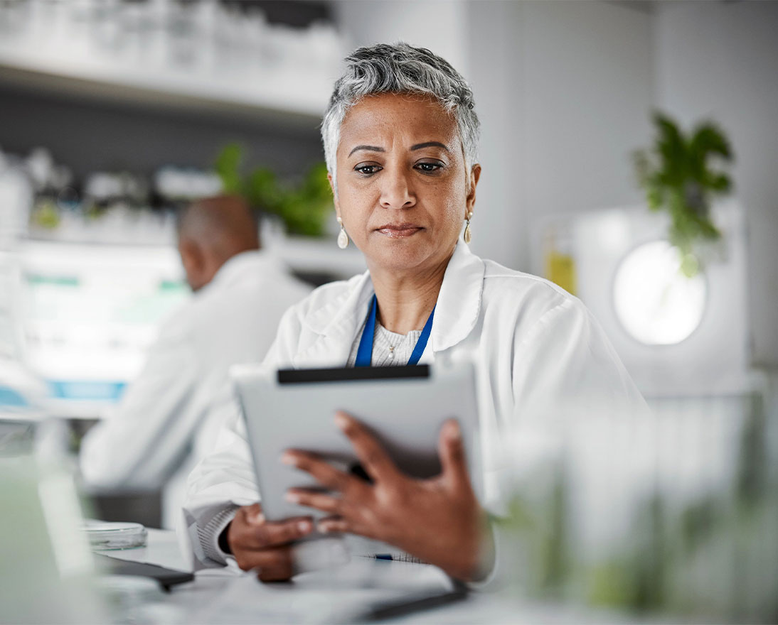 woman looking at a tablet