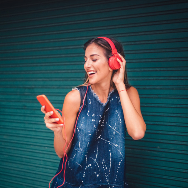 woman listening to music with headphones