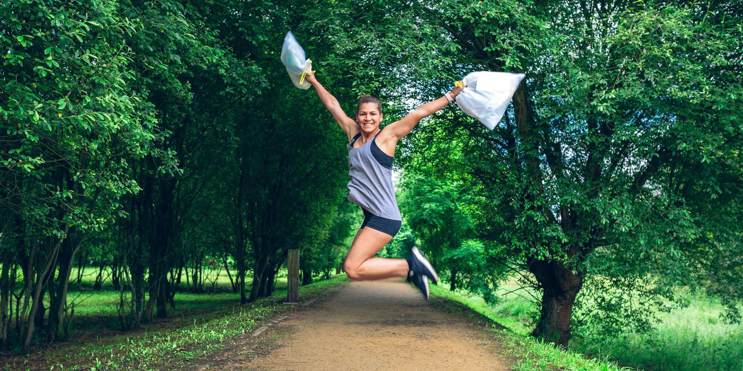 girl jumping in a park