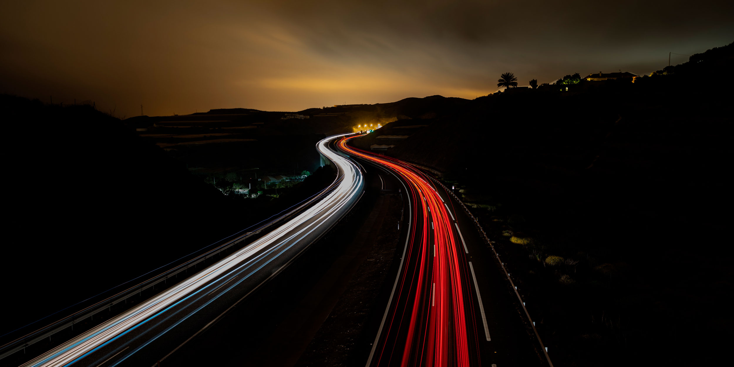 Time lapse photography of highway road at night
