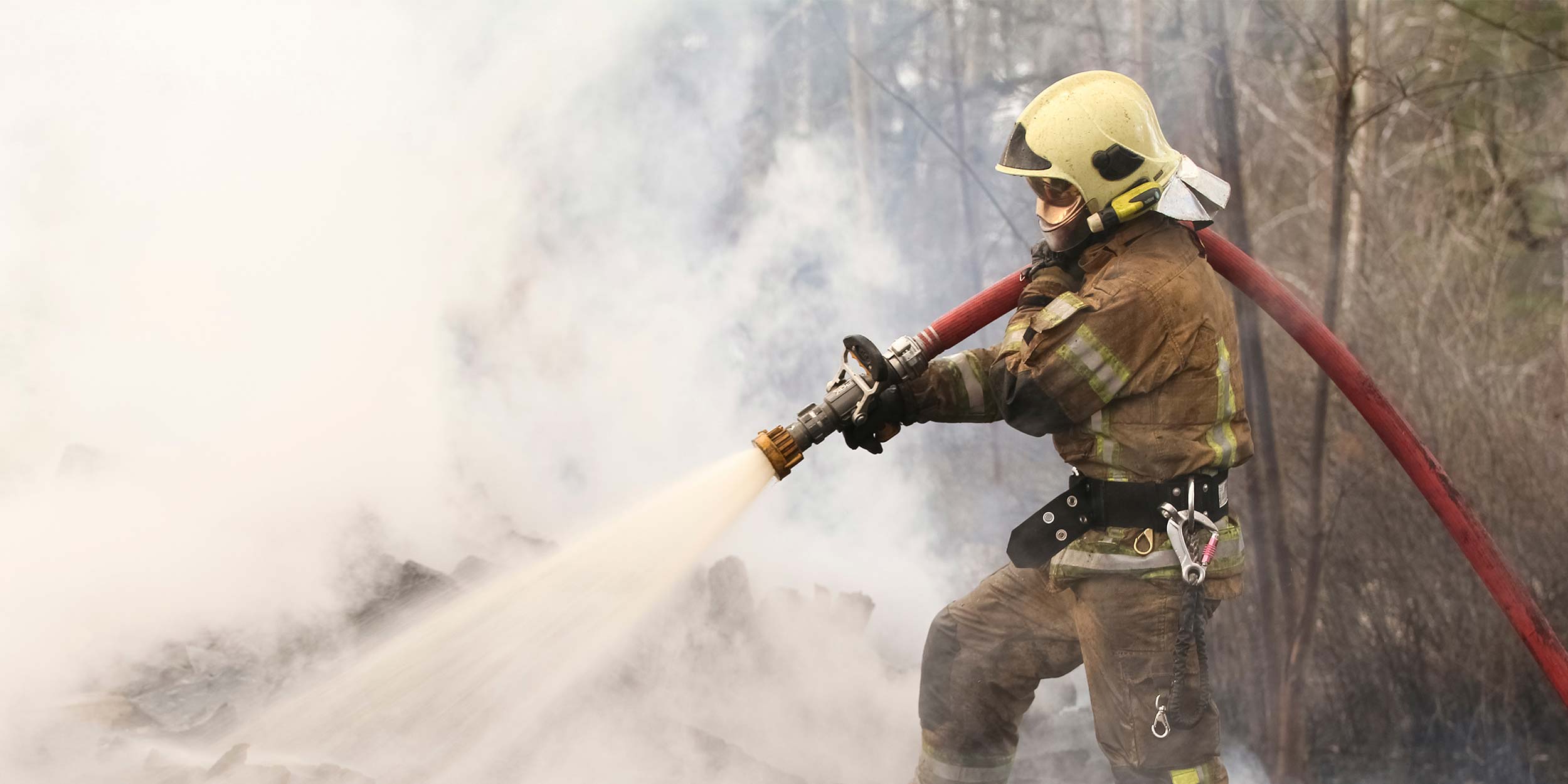 firefighter saving burning building