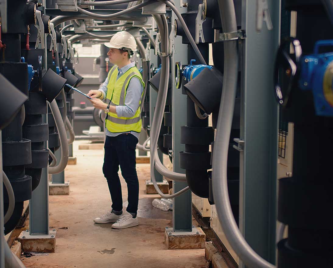 engineer checking industry cooling air conditioner