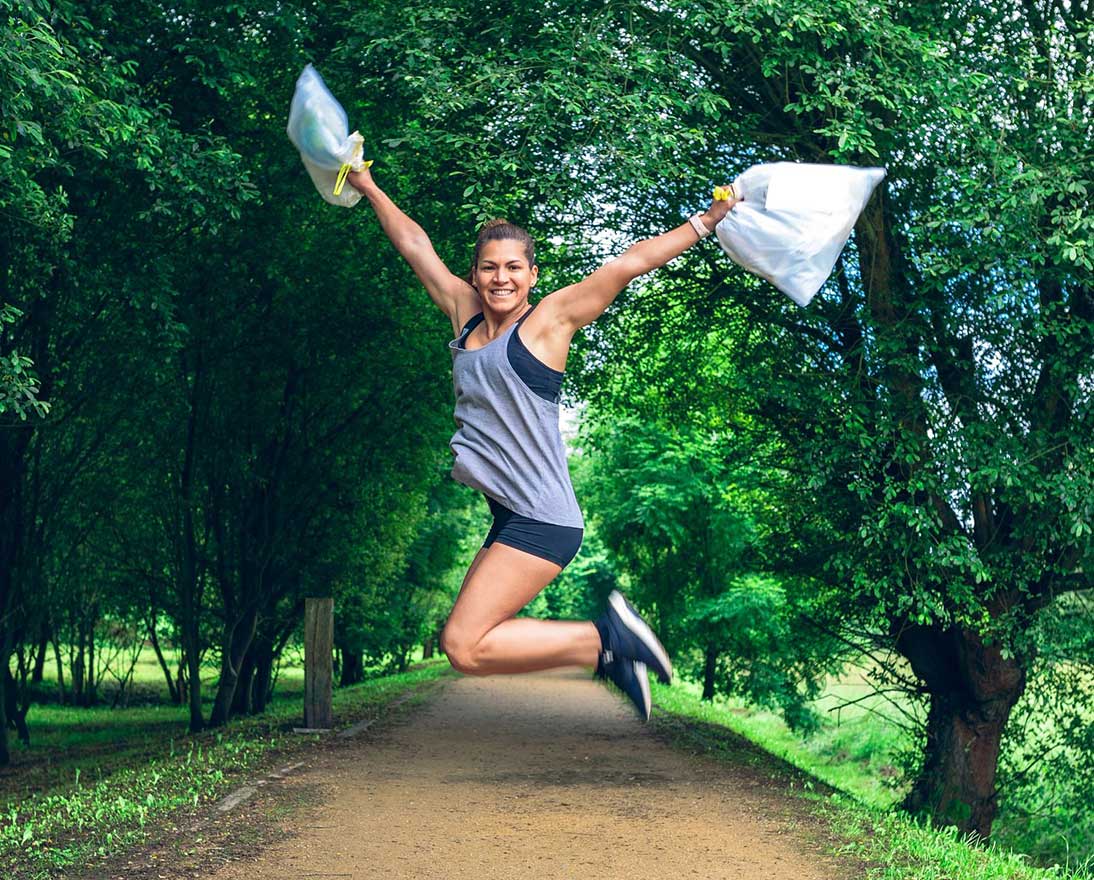 girl jumping in a park