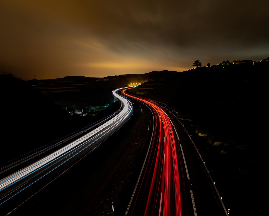 Time lapse photography of highway road at night