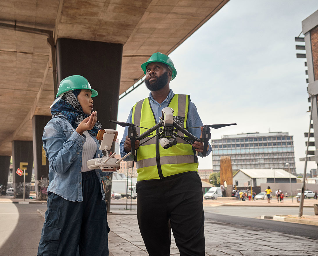 woman and man with drone