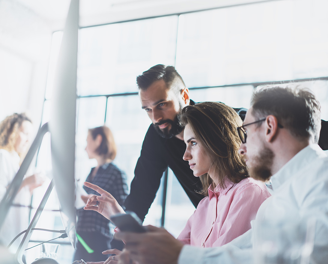 Young professionals work in modern office