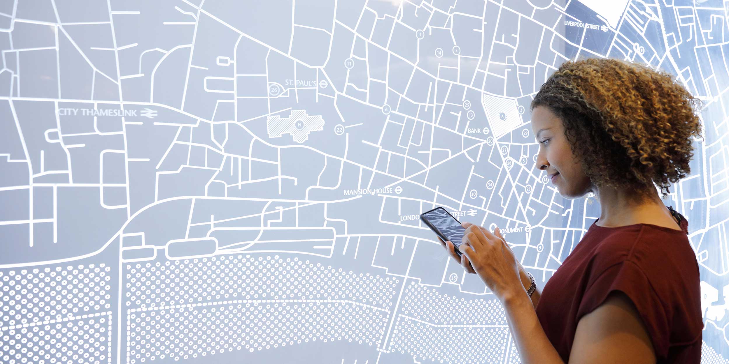 woman holding phone