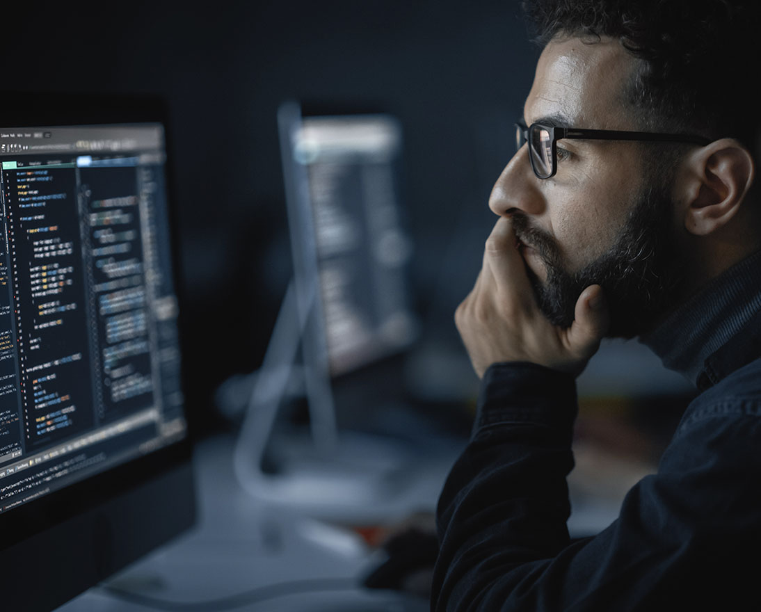 man looking at the screen