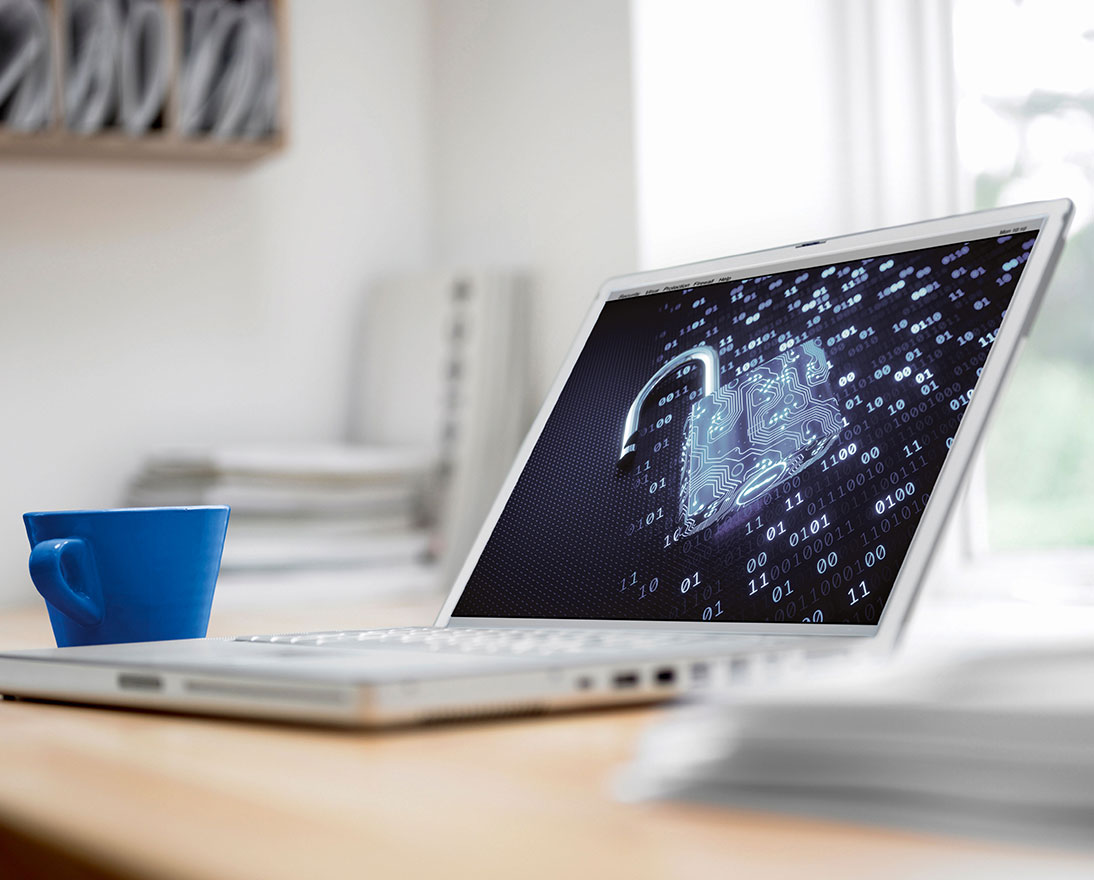 laptop with blue cup