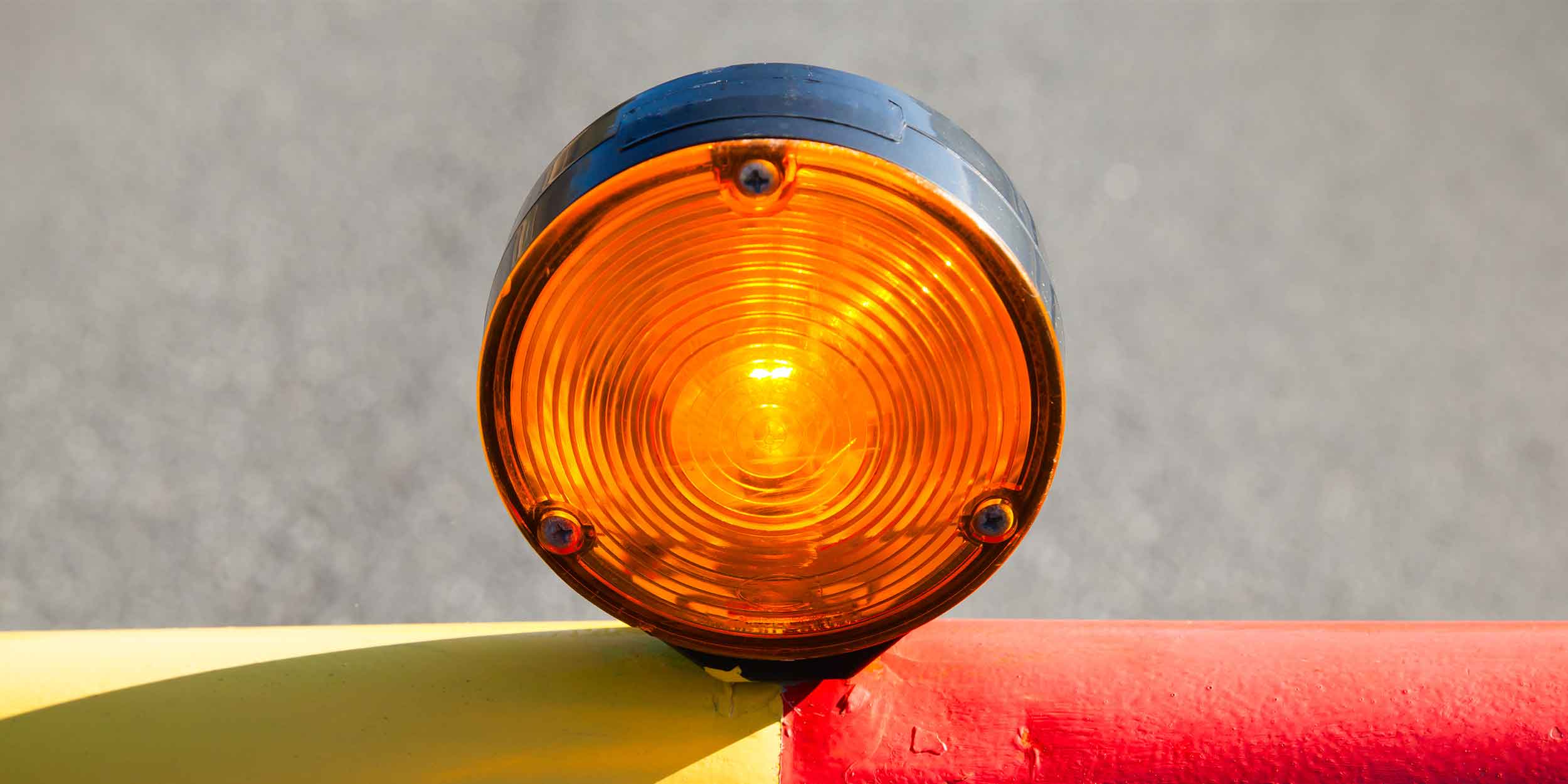 Red light on the automatic road barrier
