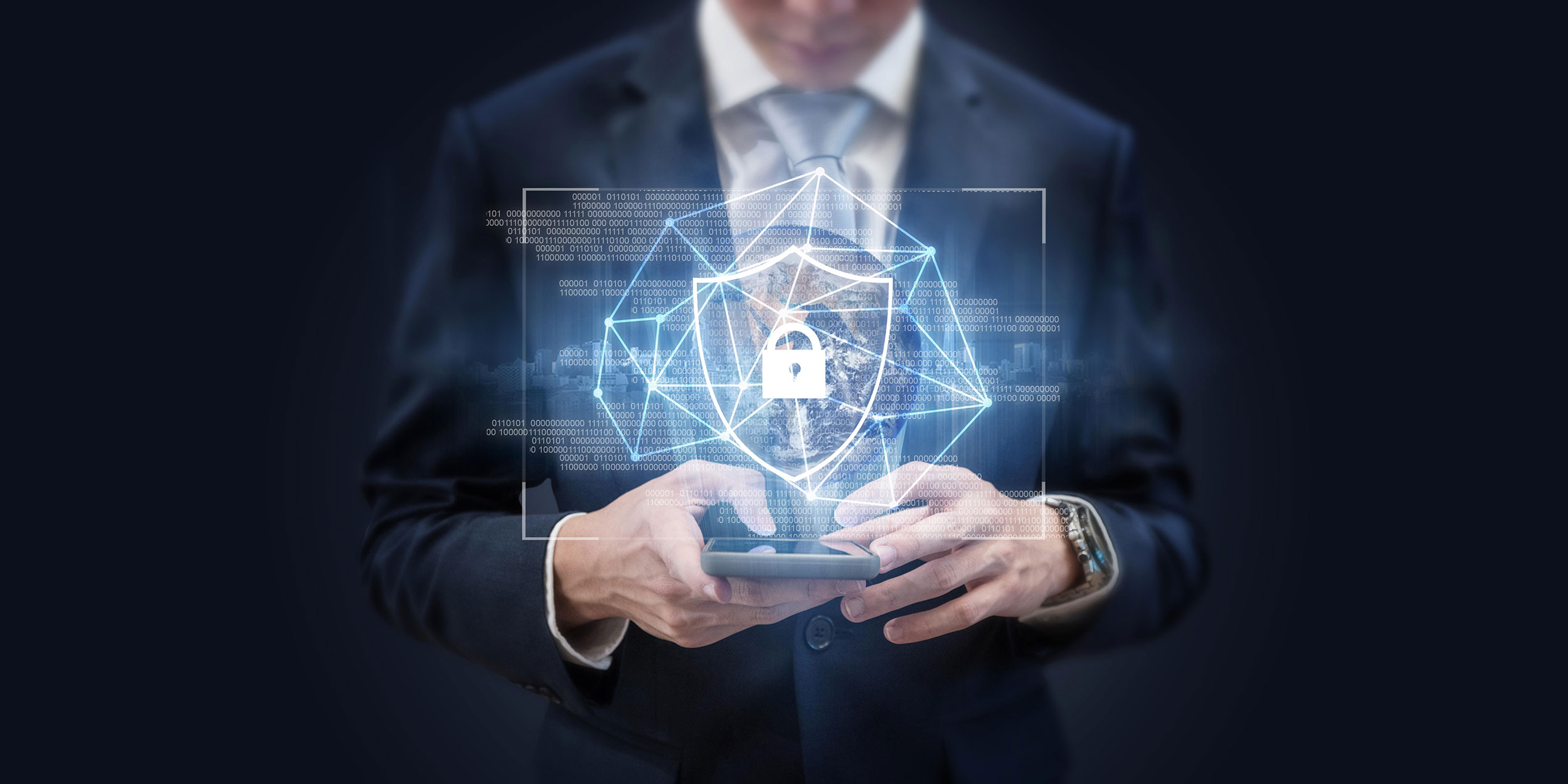 man holding phone cyber risk