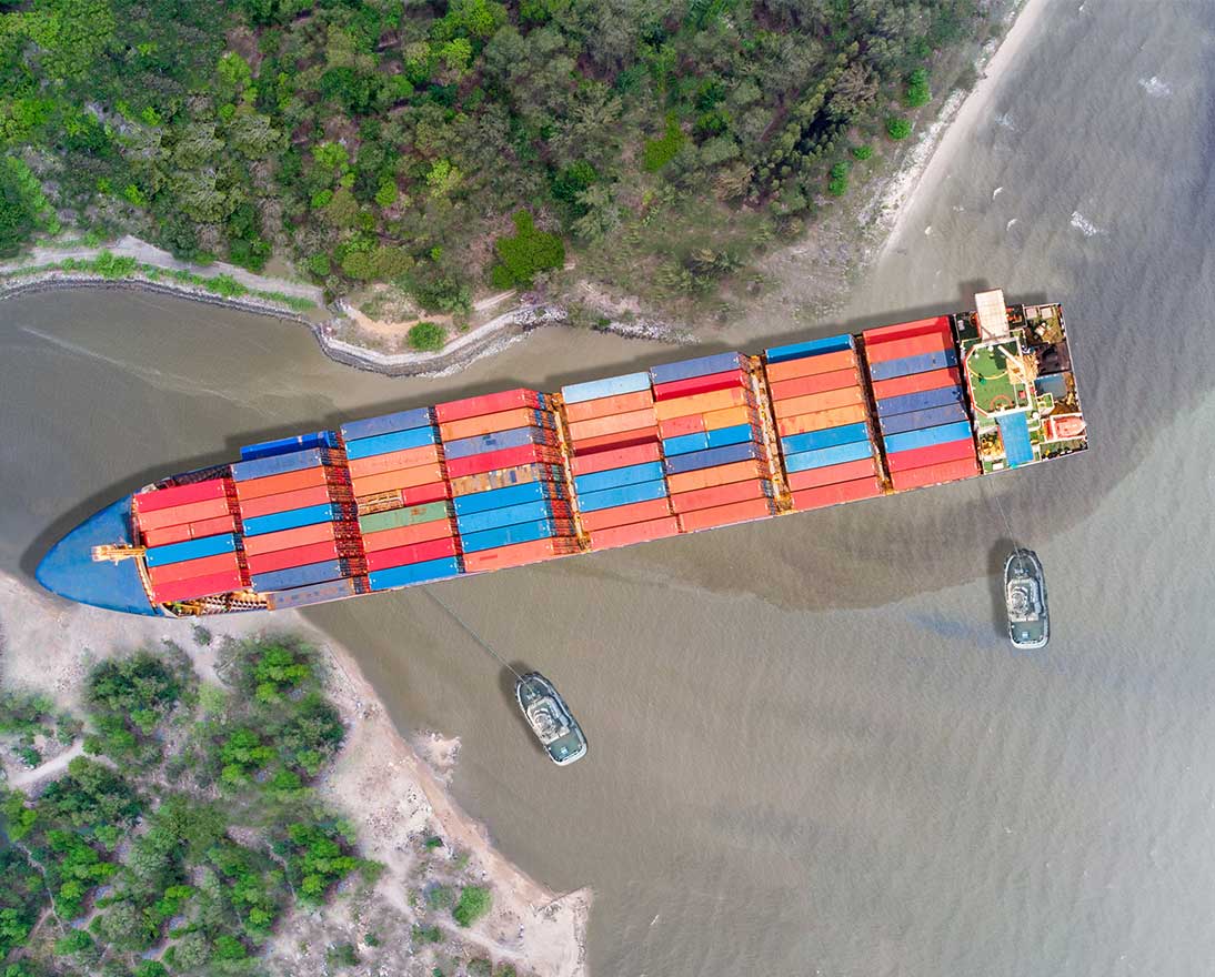 Canal blocked by huge cargo container ship