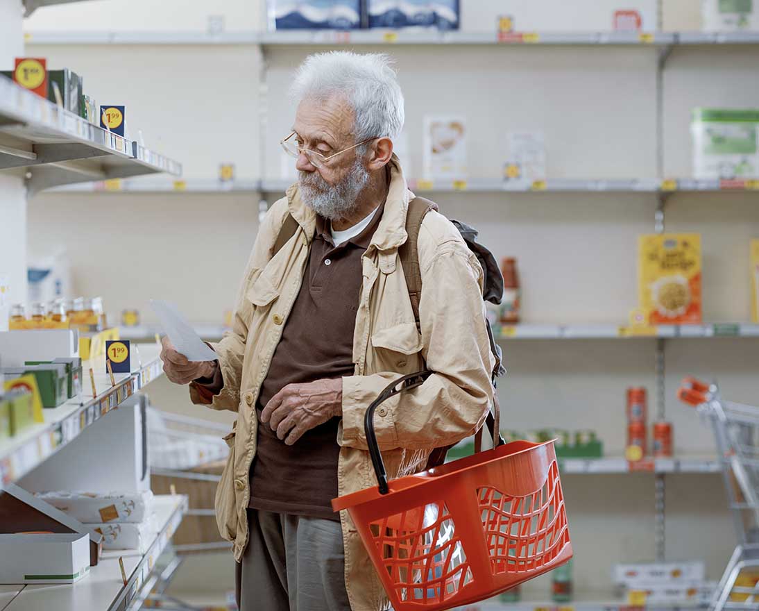 man in the supermarket with list