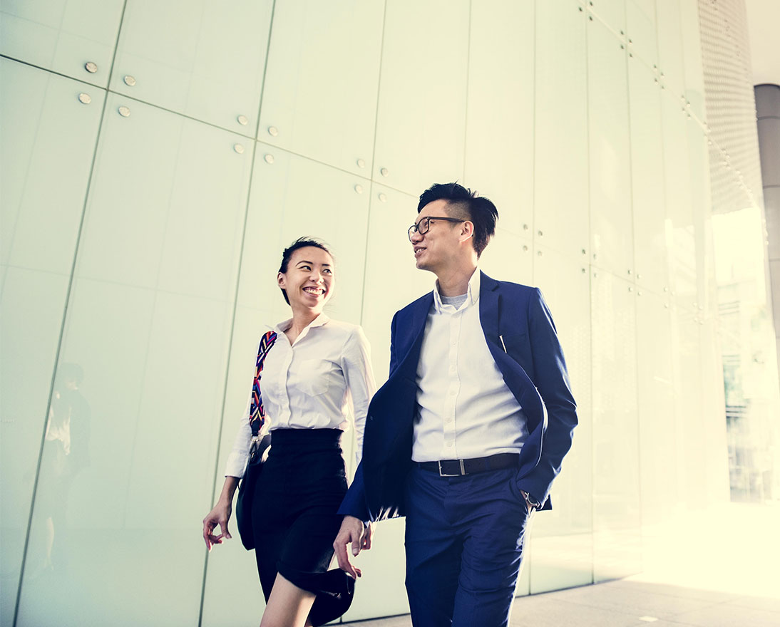 teaser man and woman walking