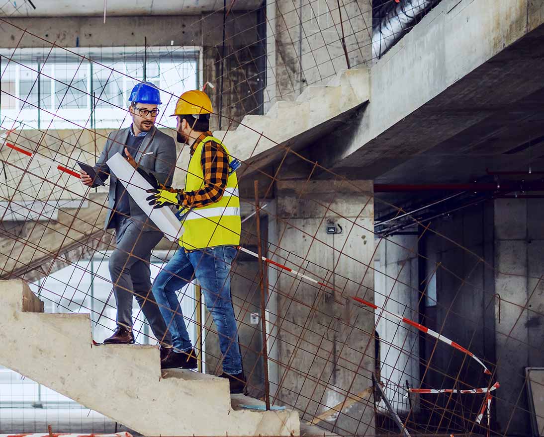 men at building site