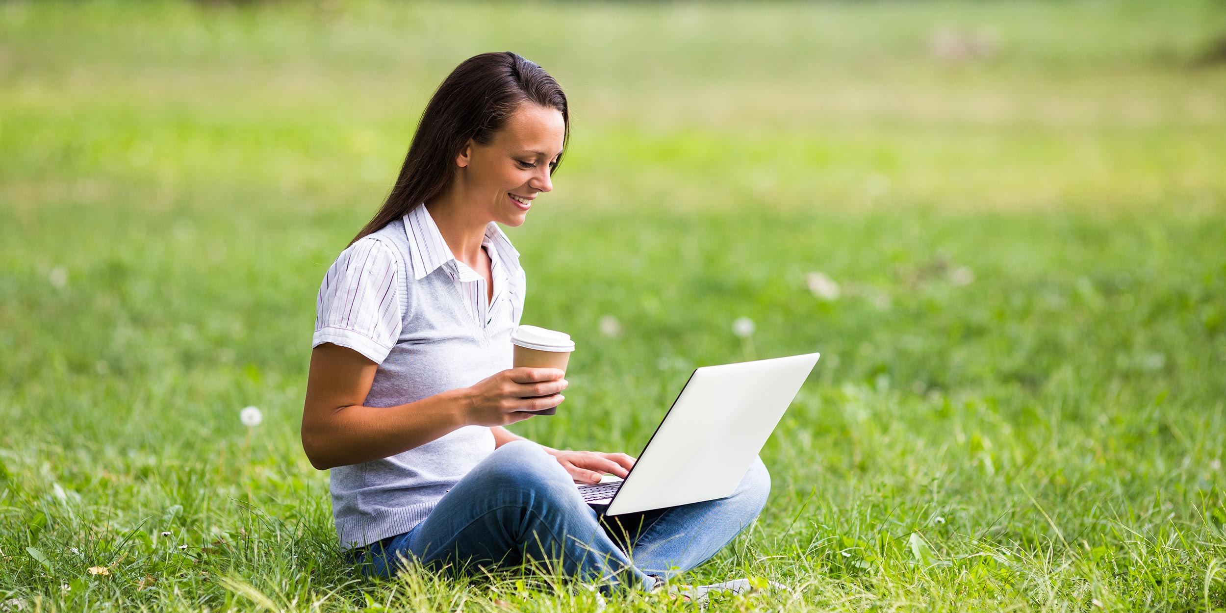 woman on laptop outside
