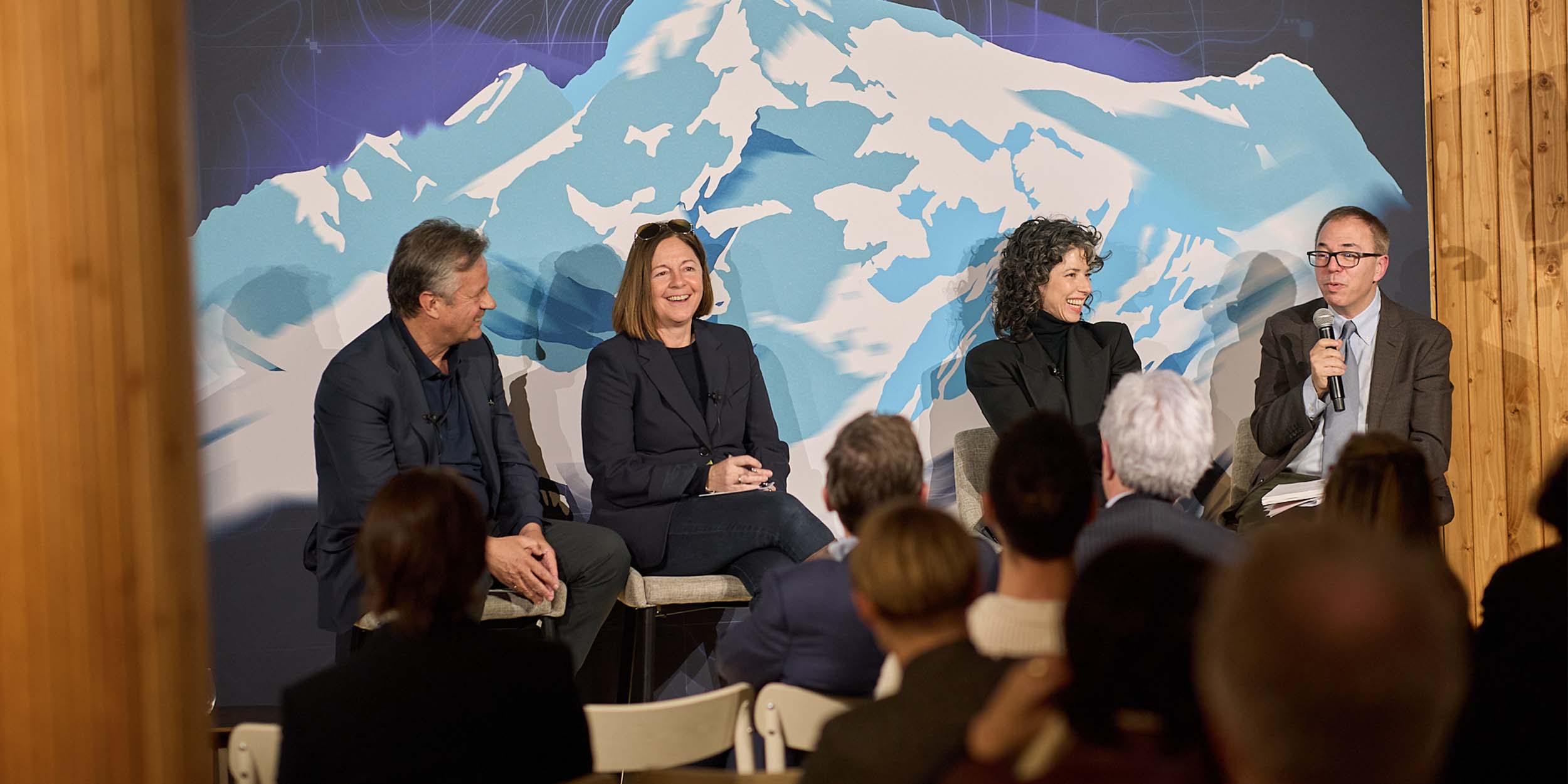 people having an interview on a stage