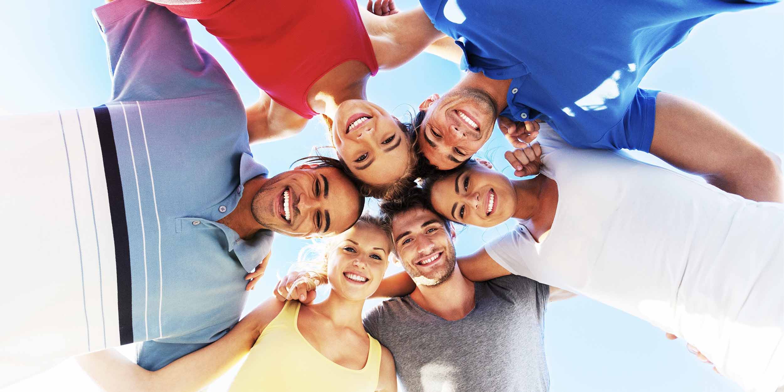 group of young adults in a circle