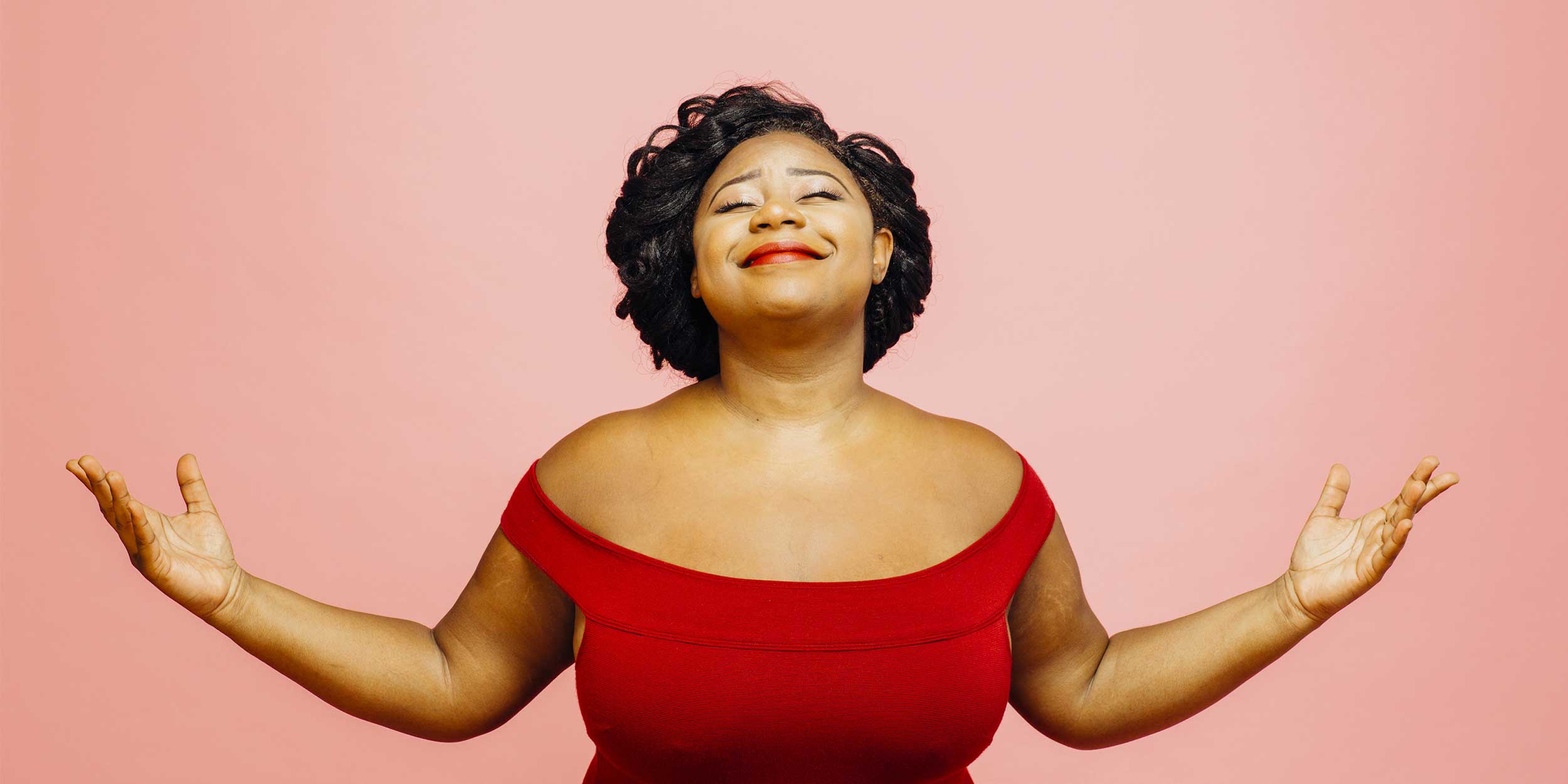 happy woman wearing red dress