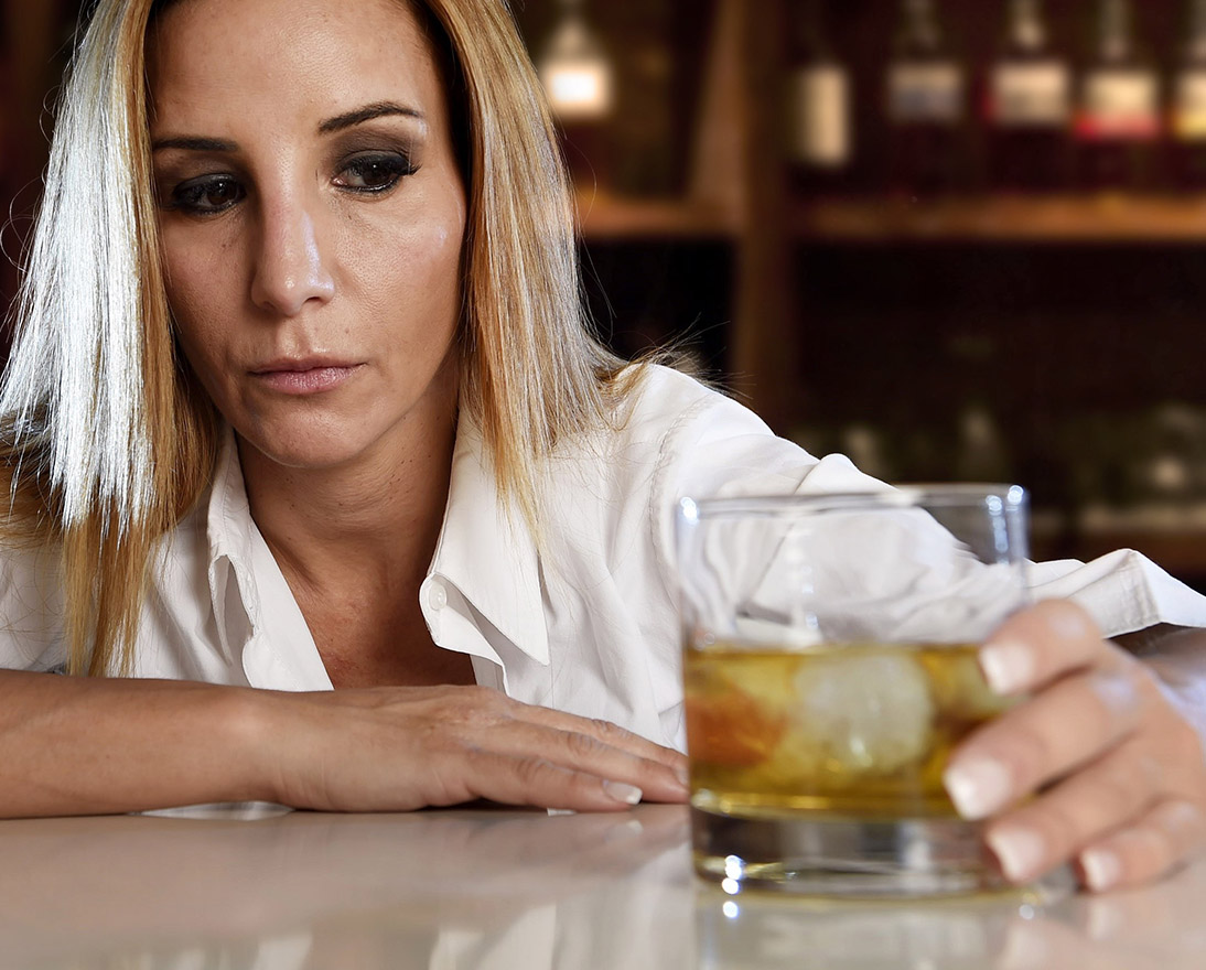 woman holding glass