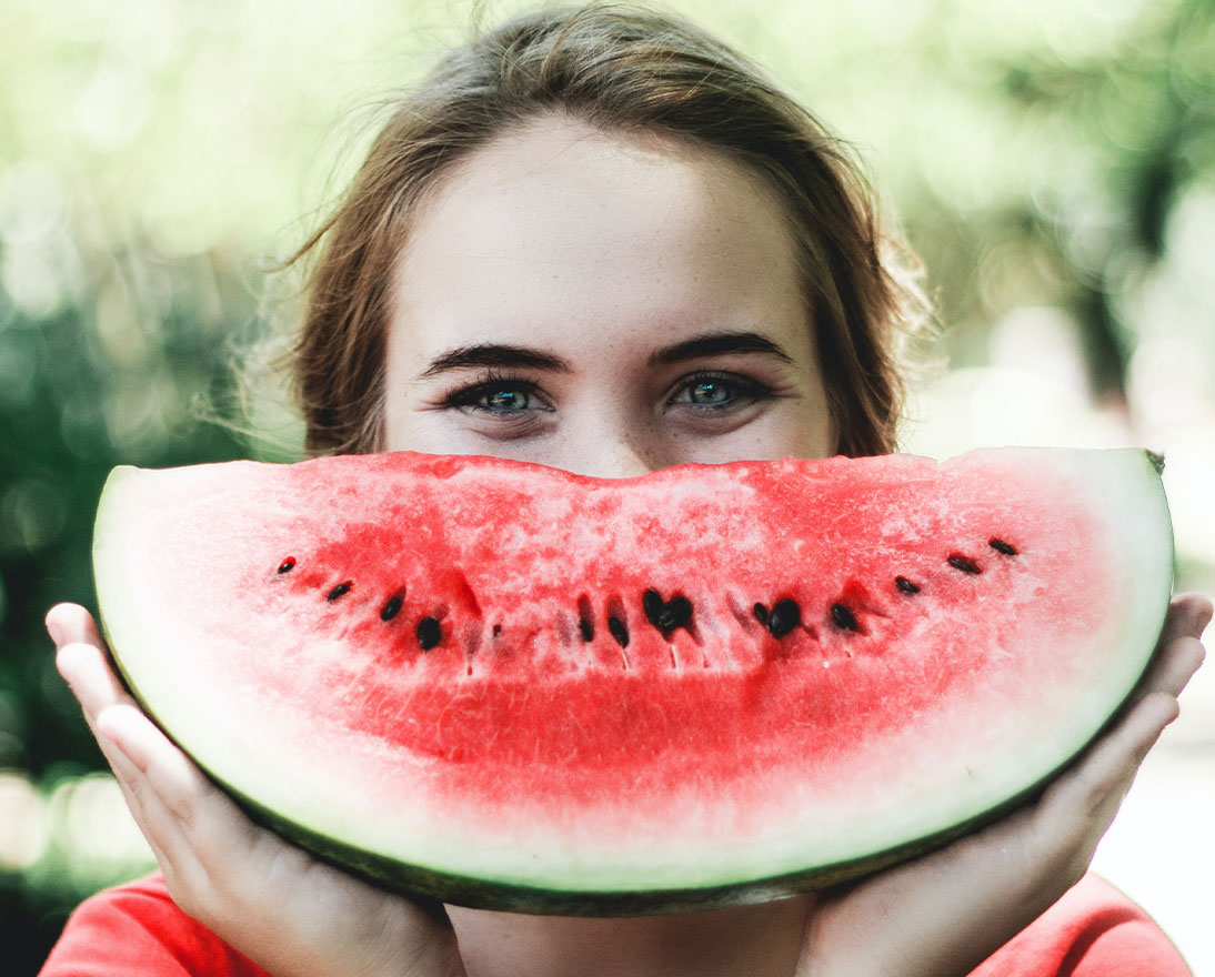 Woman eating a vegan-friendly snack