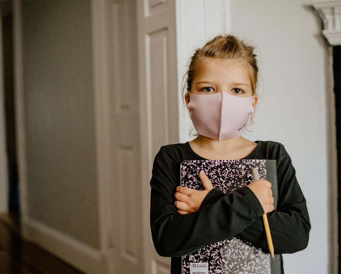 Little girl wearing a face mask