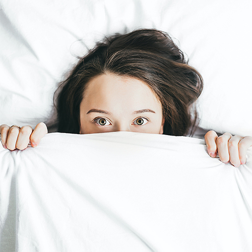 woman struggling to sleep