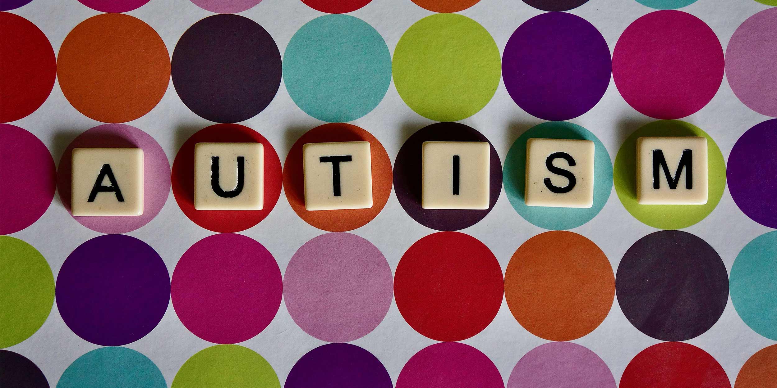 Autism written on tiles