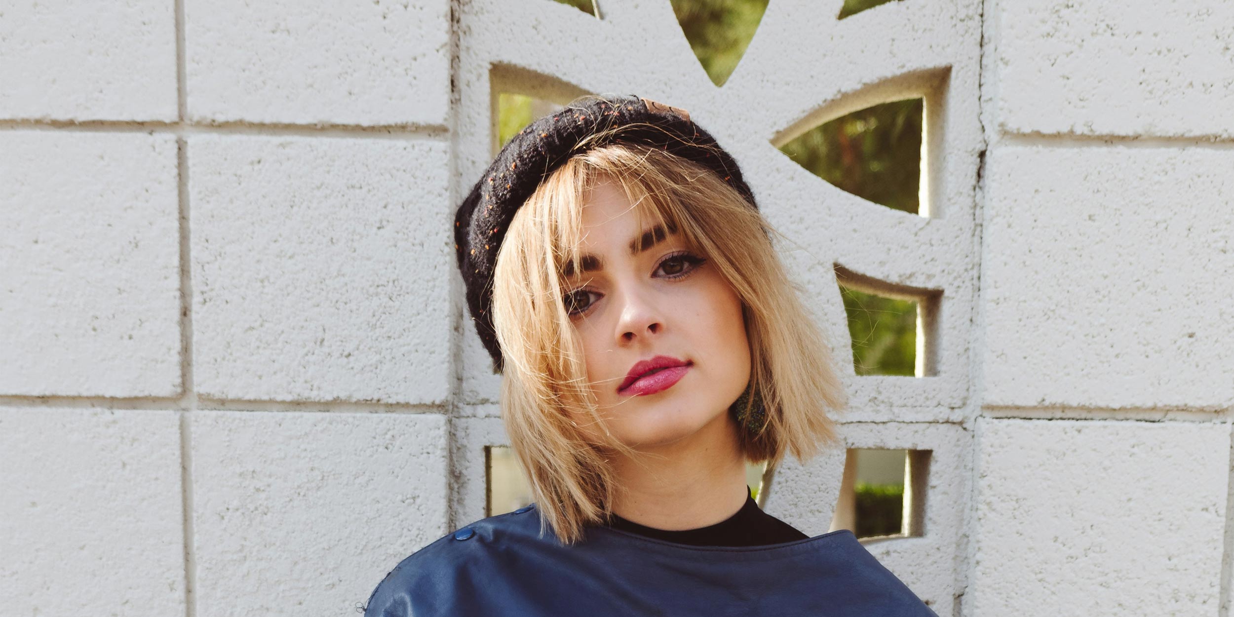 Young woman wearing a beanie hat