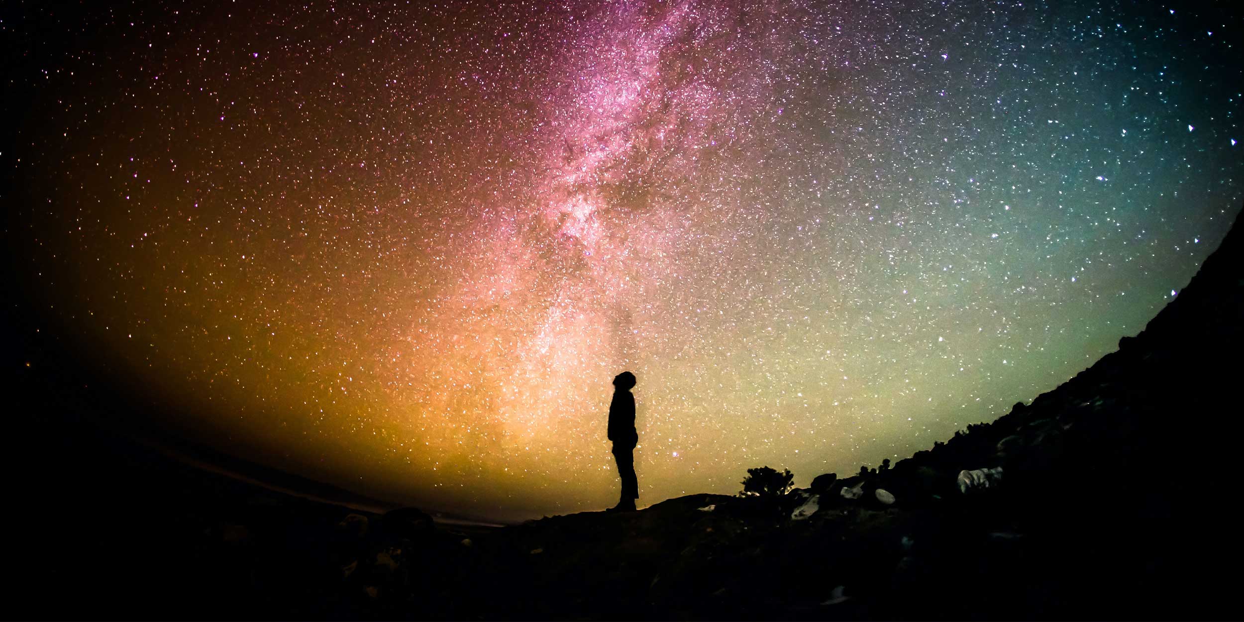 Man looking up at space weather