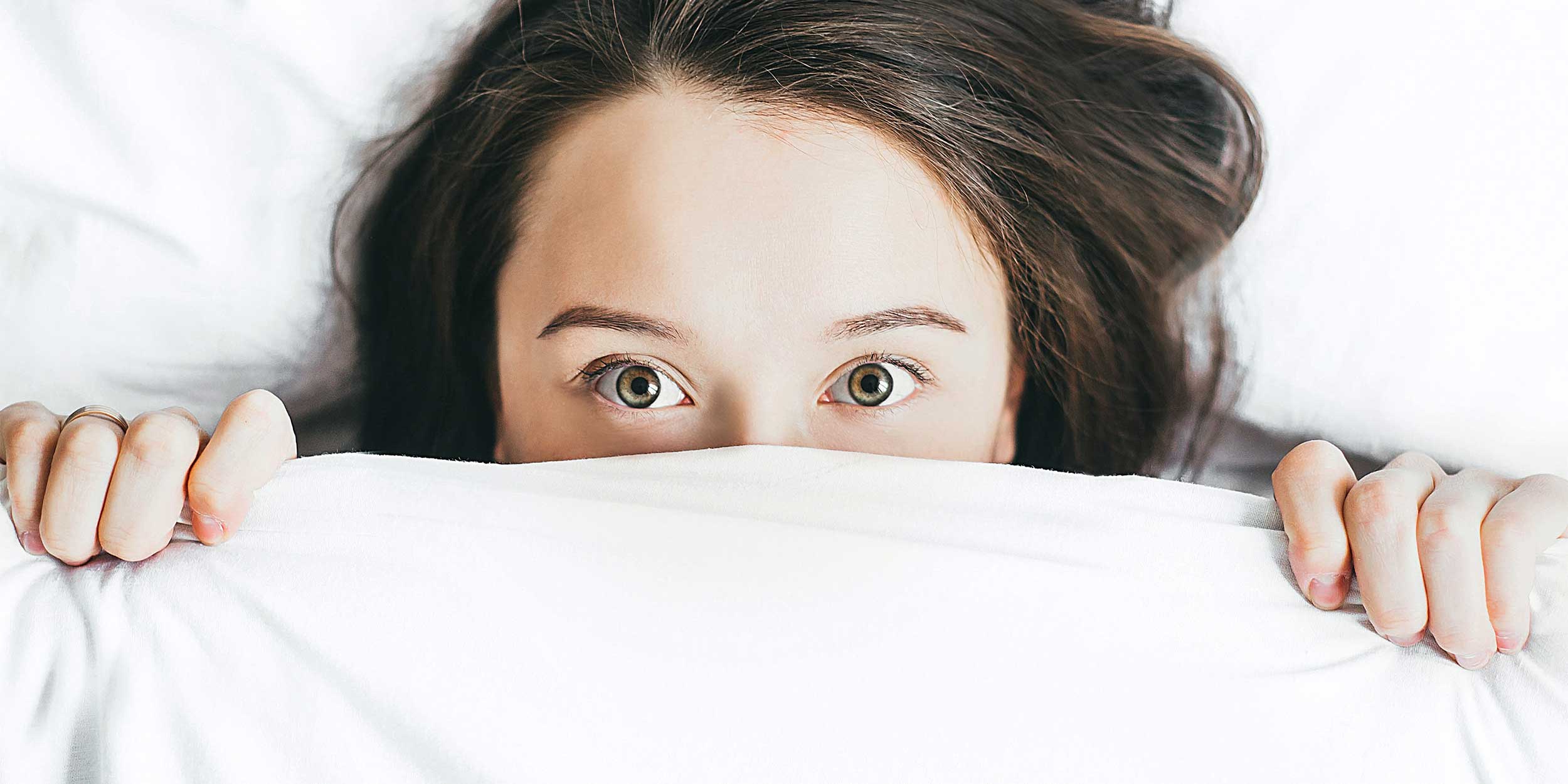 woman struggling to sleep
