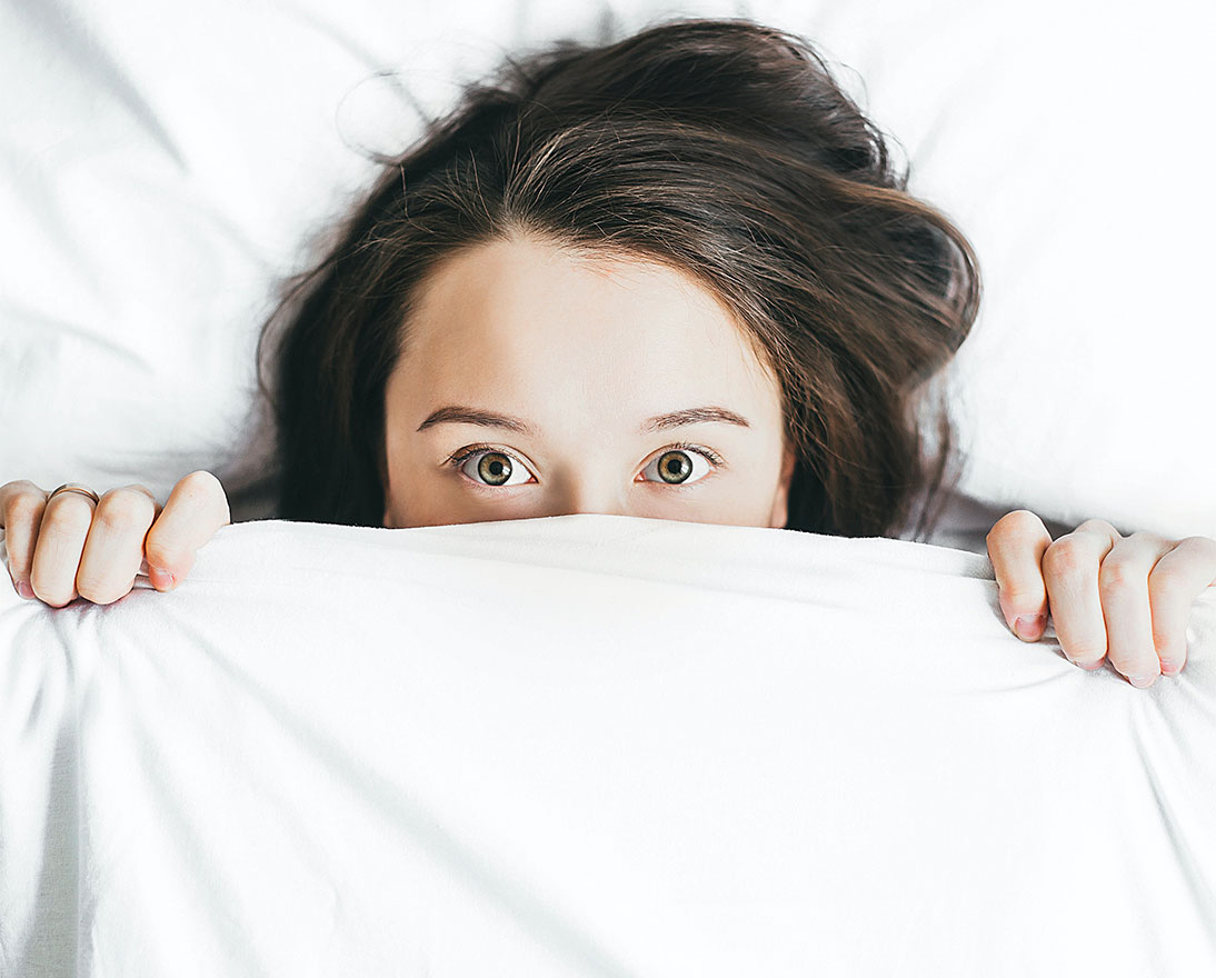 woman struggling to sleep