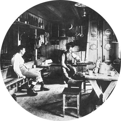 Vintage photo of mountaineers in a cabin