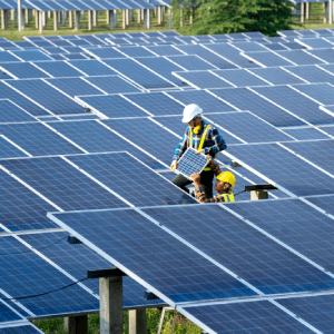 man and solar panels
