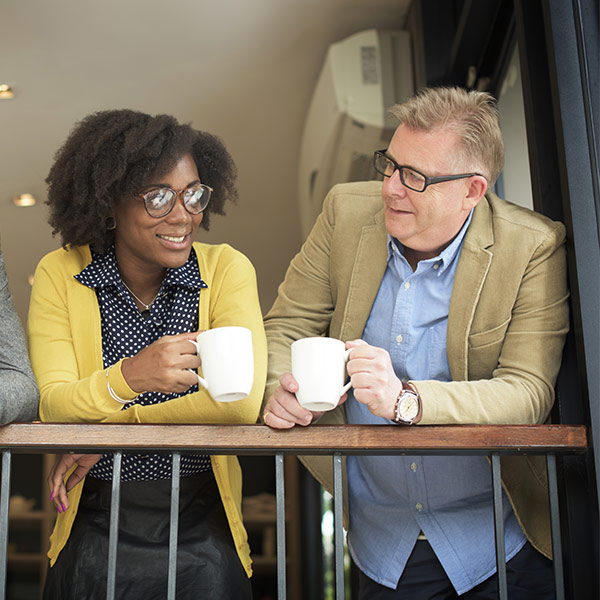 two people having a coffee together