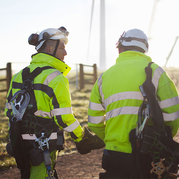 workers with yellow vest walking