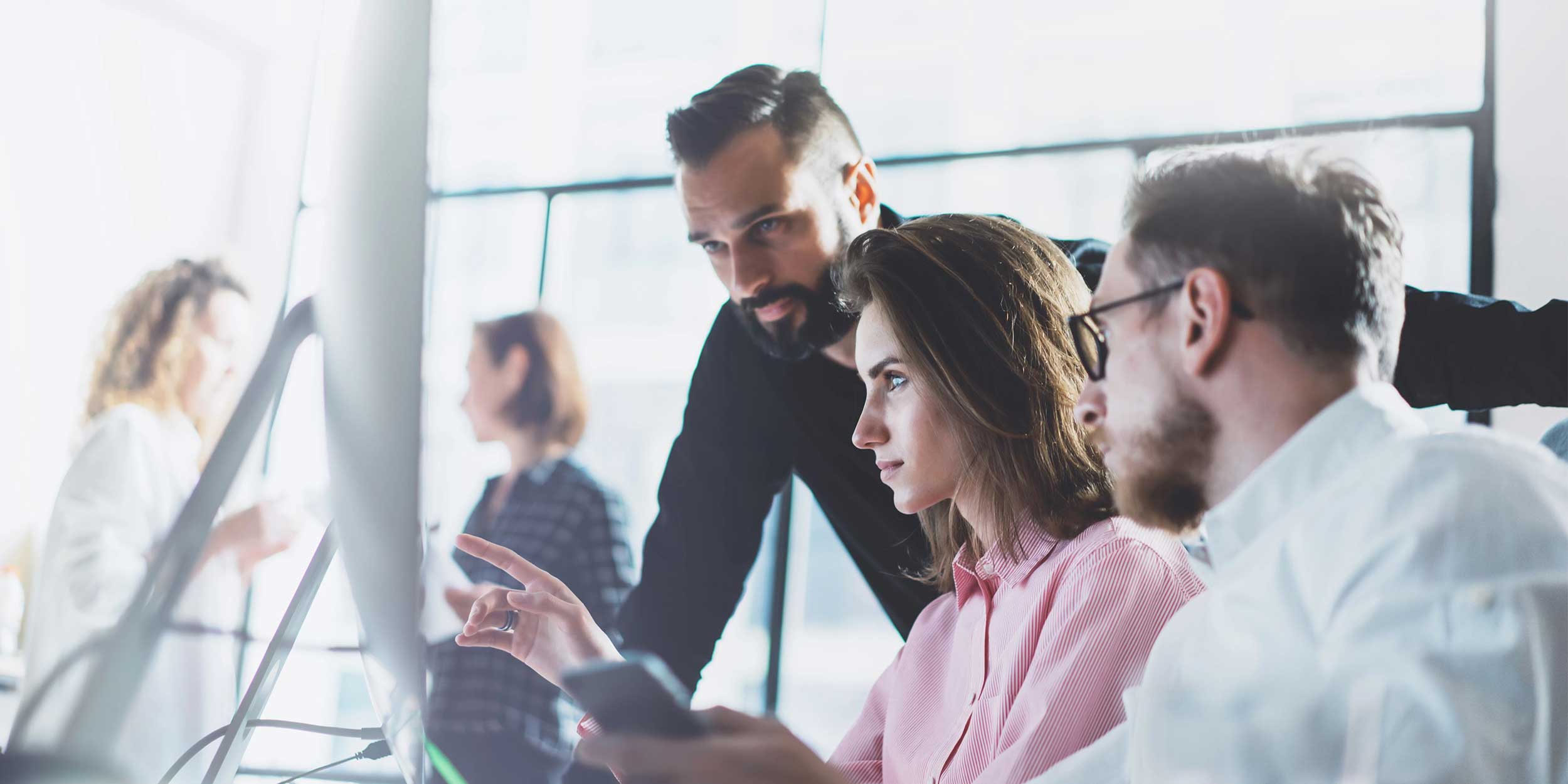 woman showing something on her computer