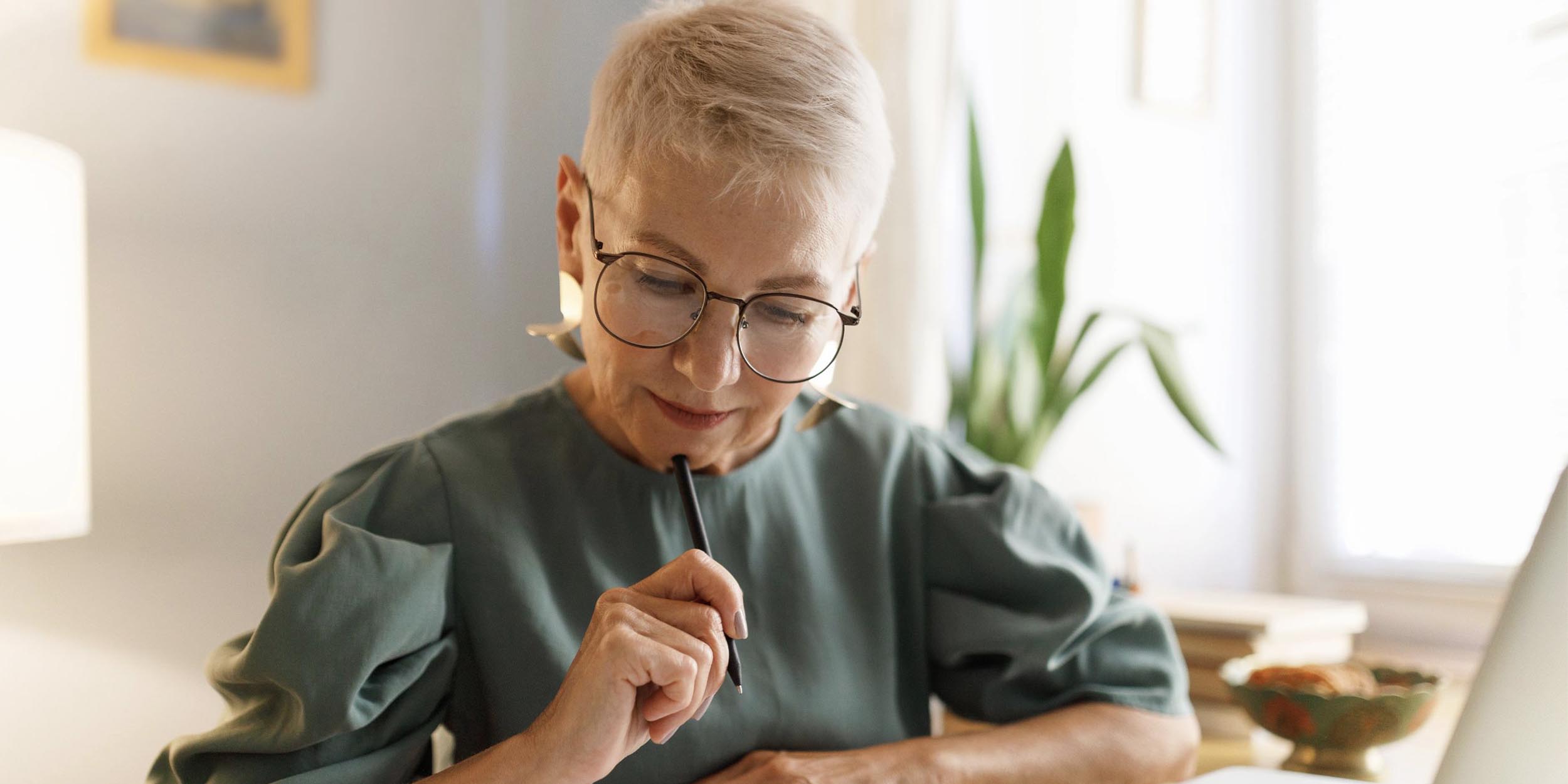woman is working on some paper work