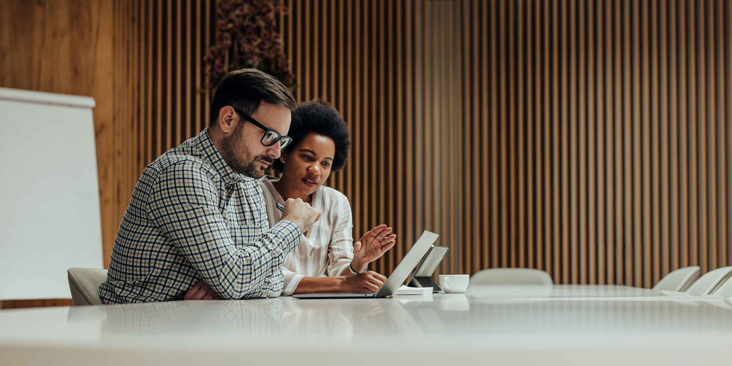 two people working together on a project