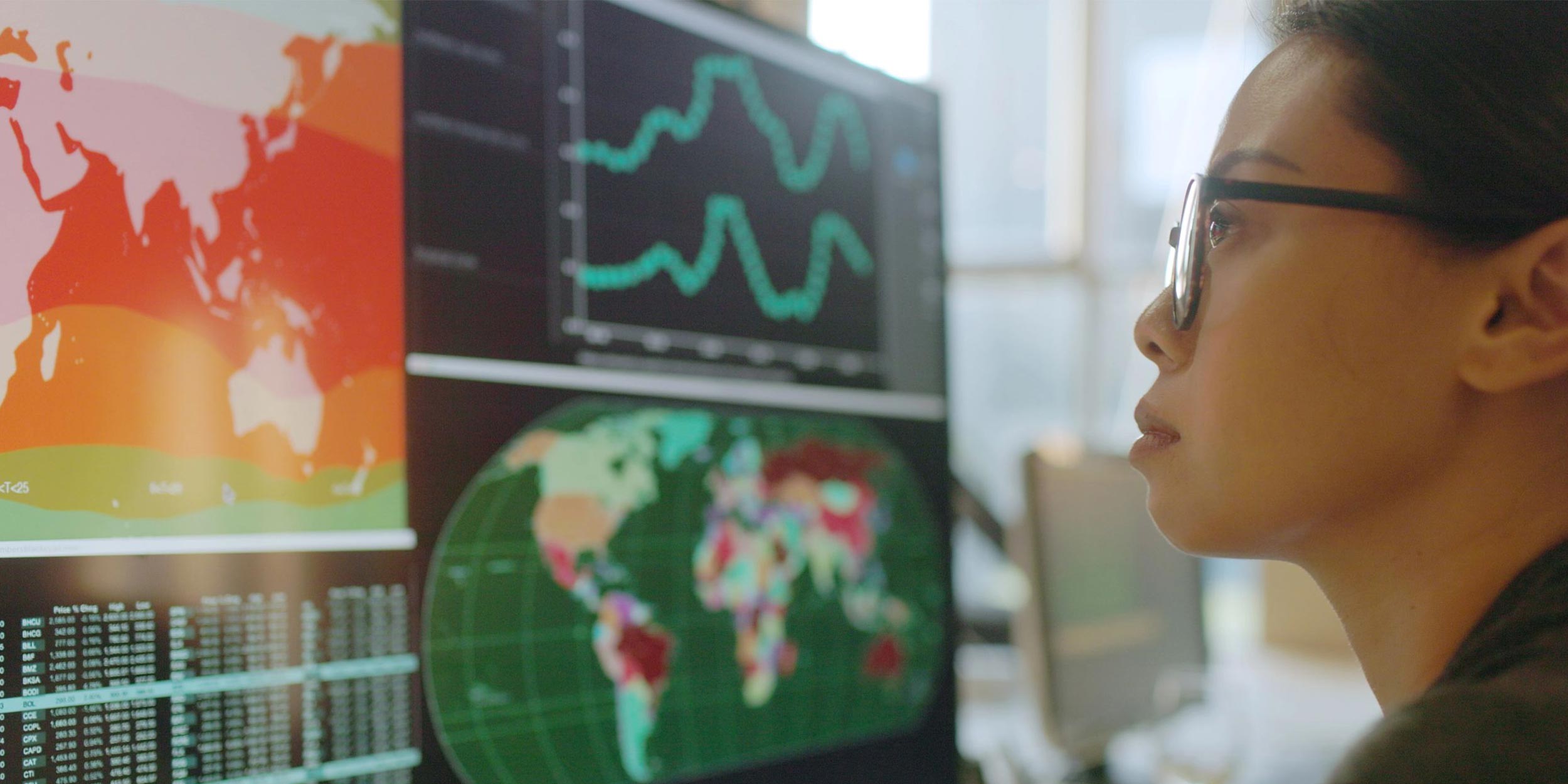 woman looking on graphs