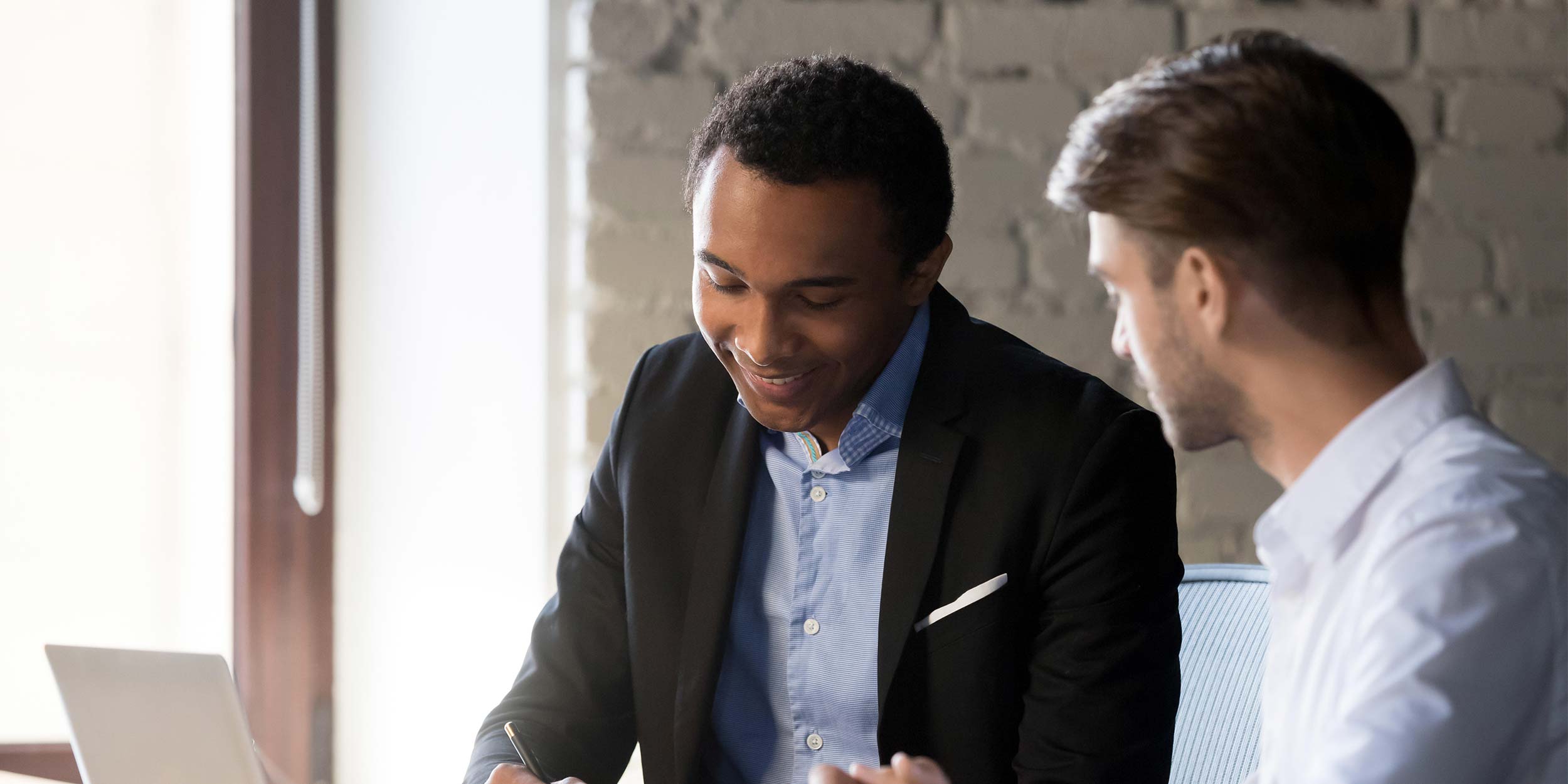 business partners signing contract