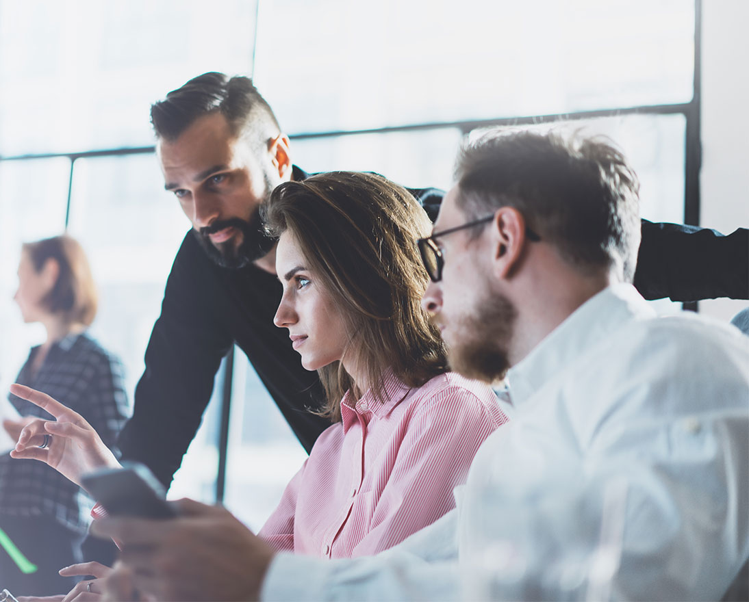 Young professionals work in office