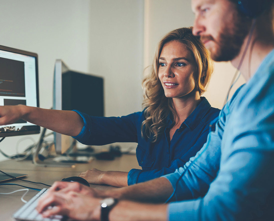woman is pointing on computer