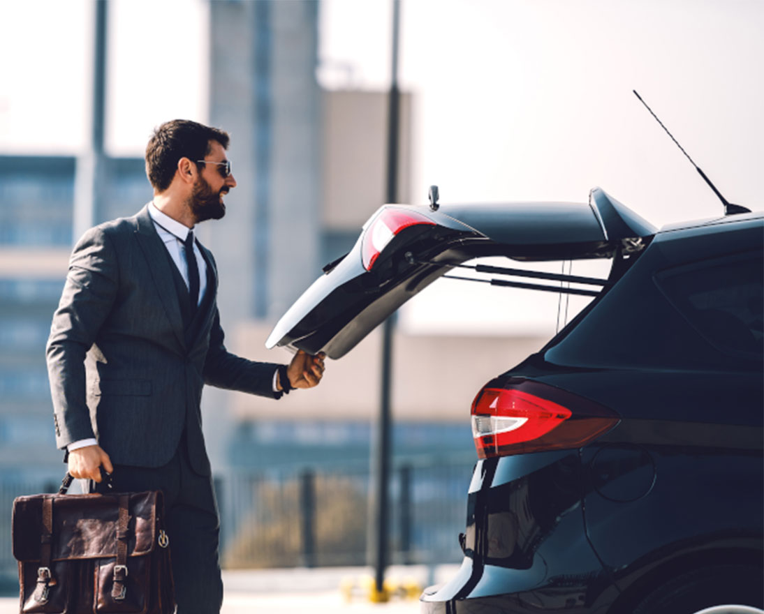 man closes the trunk