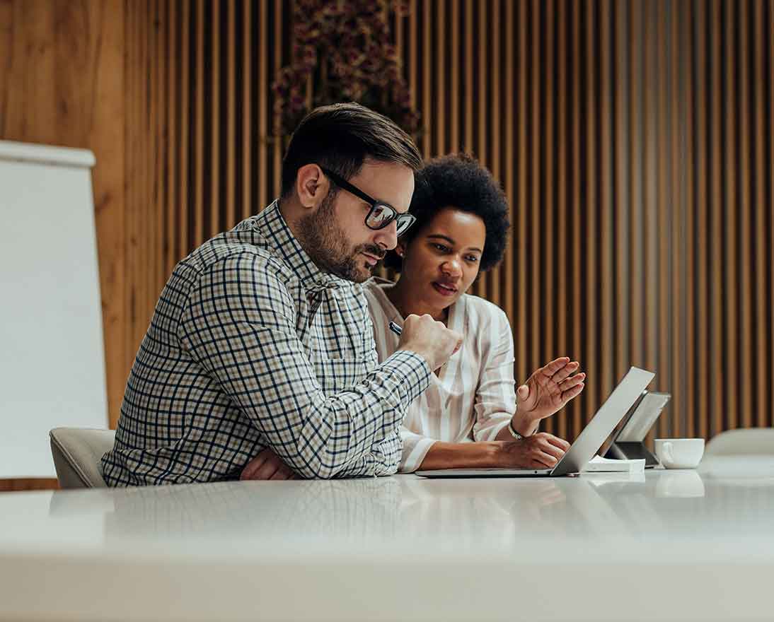 two people working together on a project