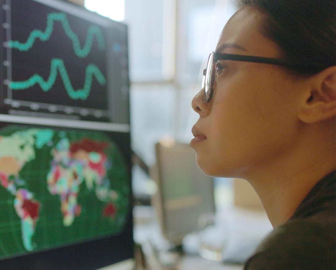 woman looking on graphs