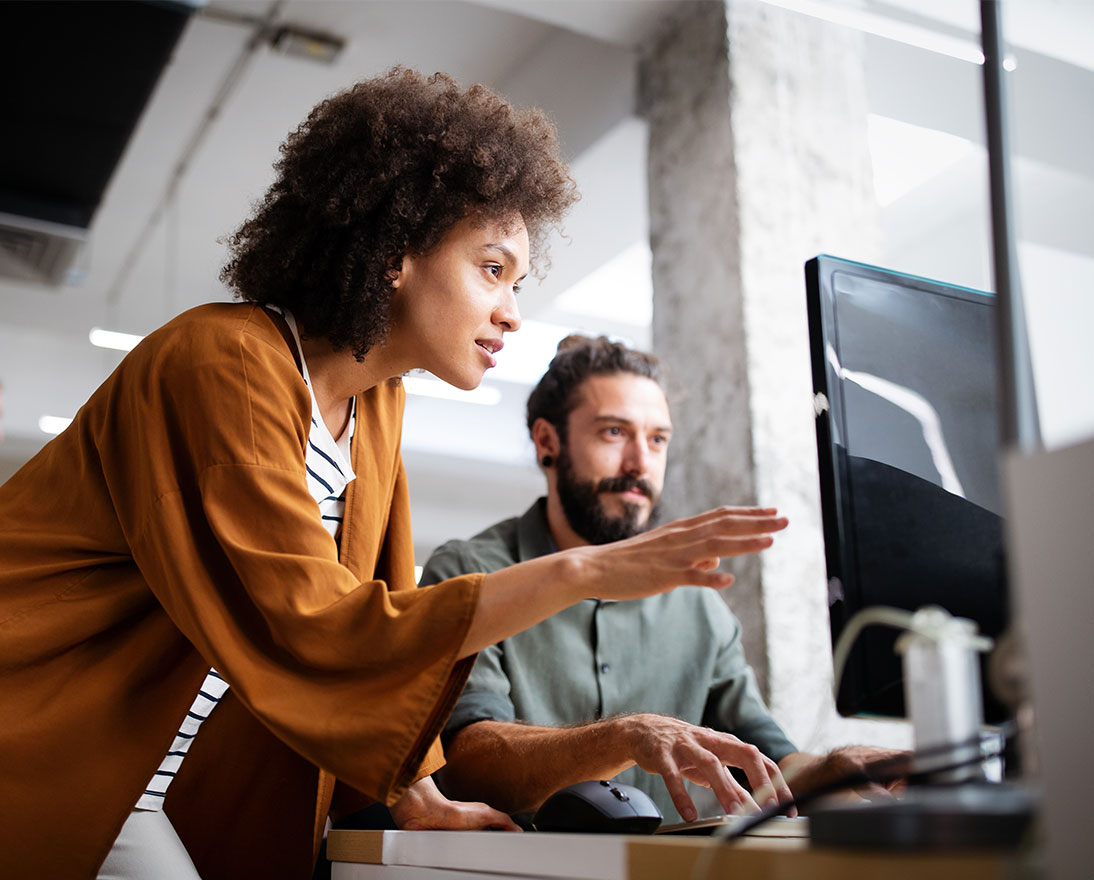 woman is showing something on computer